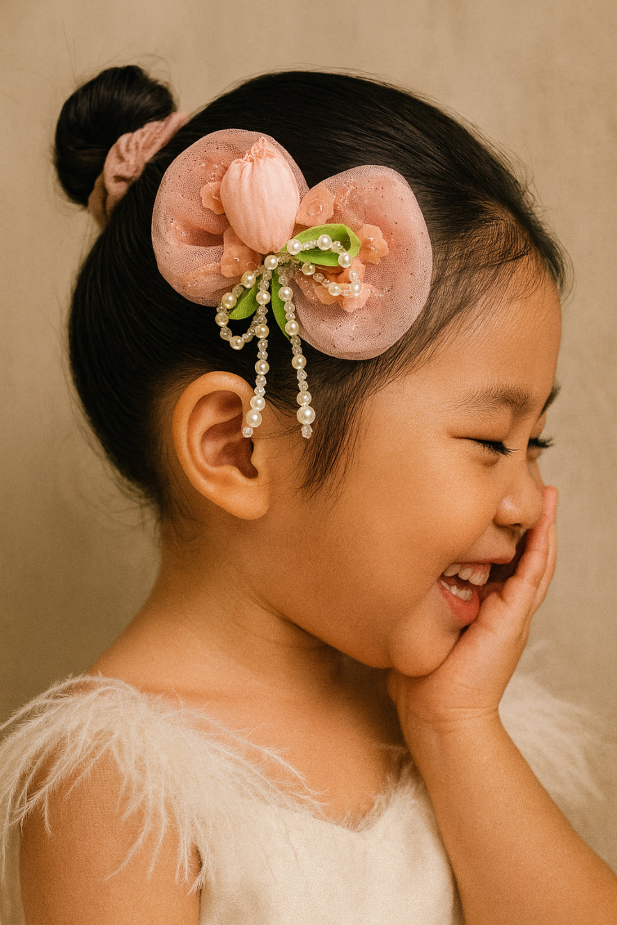 Choko Floral Bow Hair Clip with Pearl Tassels in Soft Peach Sheer Fabric for Girls Party Wear