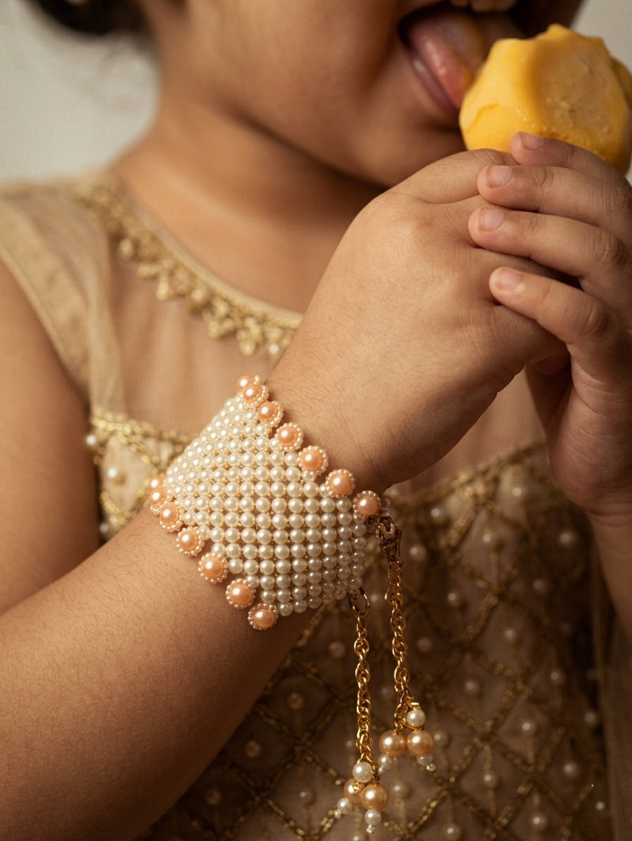 Choko Girls Traditional Woven Pearl Bracelet with Peach Accents